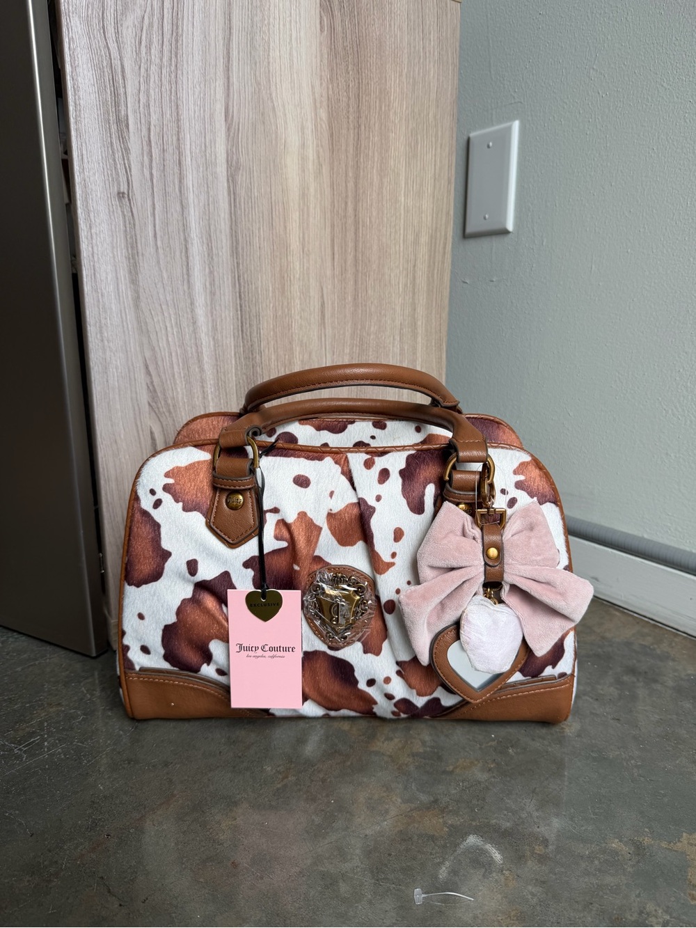 Juicy Couture Brown & White Cow Print Handbag with Pink Bow Charm